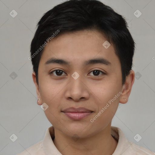 Joyful asian young-adult male with short  black hair and brown eyes