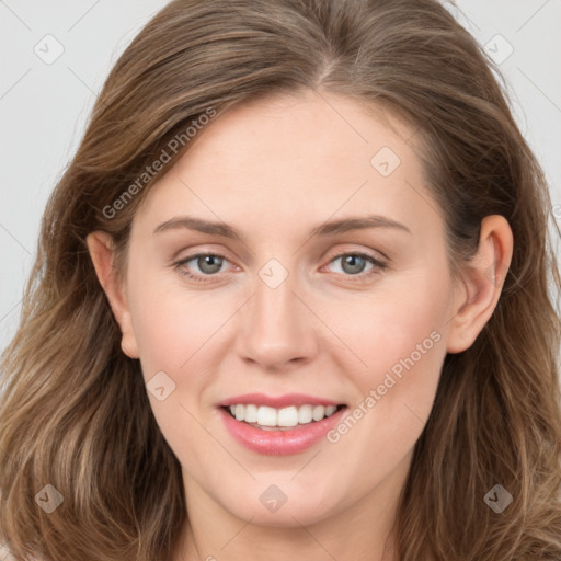 Joyful white young-adult female with long  brown hair and grey eyes