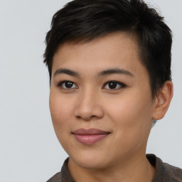 Joyful asian young-adult female with short  brown hair and brown eyes