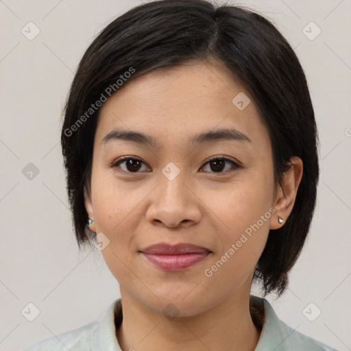 Joyful asian young-adult female with medium  brown hair and brown eyes