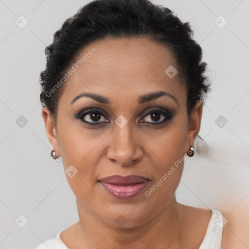 Joyful black young-adult female with short  brown hair and brown eyes