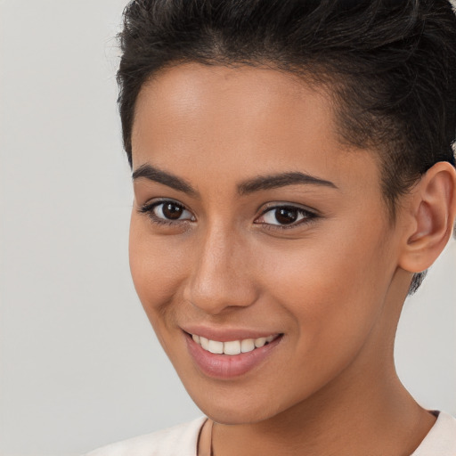 Joyful white young-adult female with short  brown hair and brown eyes