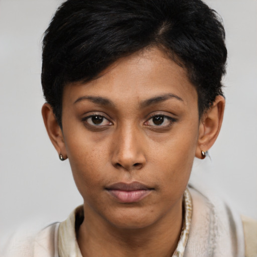Neutral latino young-adult female with short  brown hair and brown eyes
