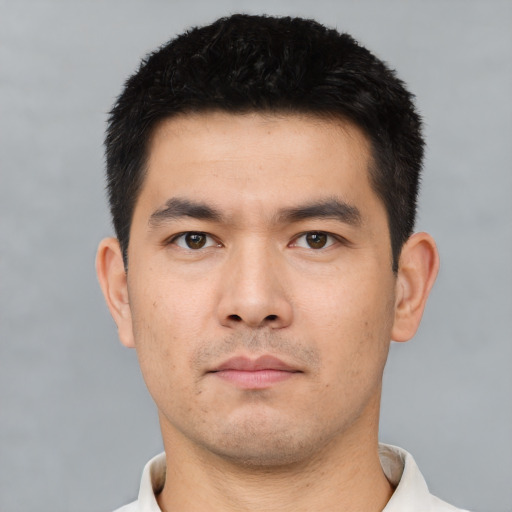 Neutral asian young-adult male with short  black hair and brown eyes