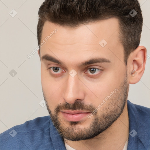 Neutral white young-adult male with short  brown hair and brown eyes