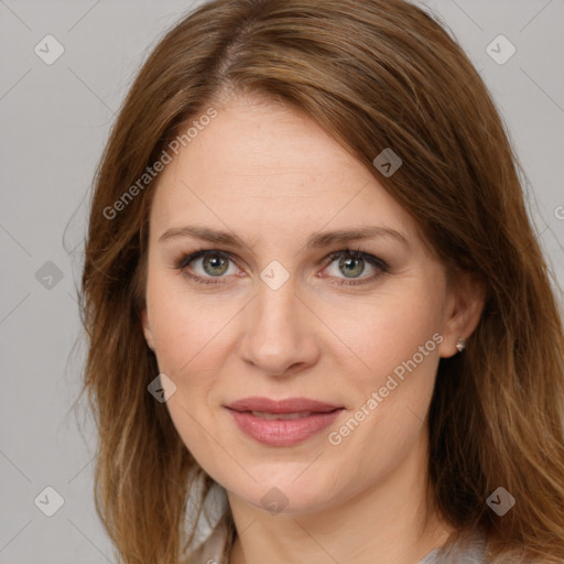 Joyful white young-adult female with long  brown hair and green eyes