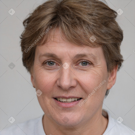 Joyful white adult female with short  brown hair and brown eyes