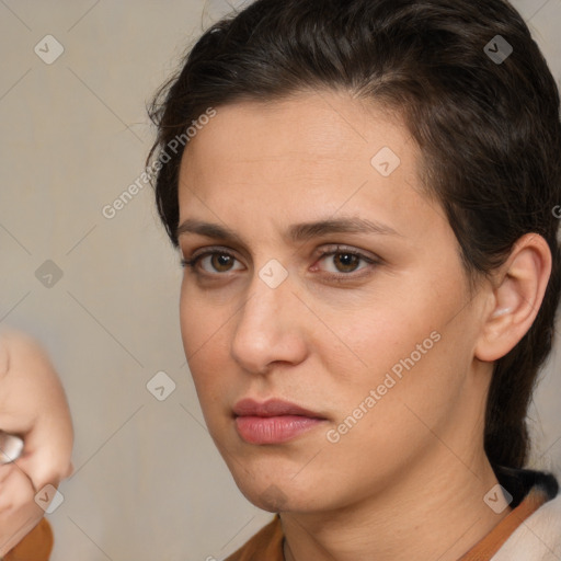 Neutral white young-adult female with medium  brown hair and brown eyes