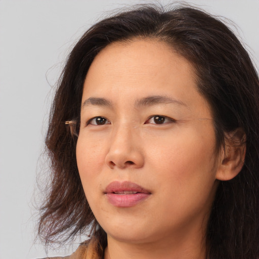 Neutral asian young-adult female with long  brown hair and brown eyes