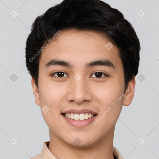 Joyful white young-adult male with short  black hair and brown eyes