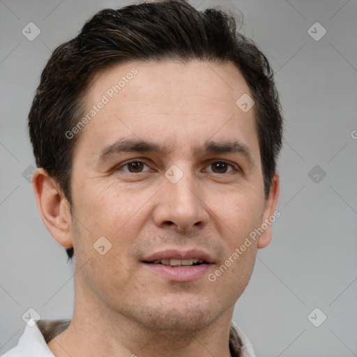 Joyful white adult male with short  brown hair and brown eyes