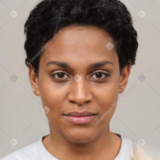 Joyful black young-adult female with short  black hair and brown eyes