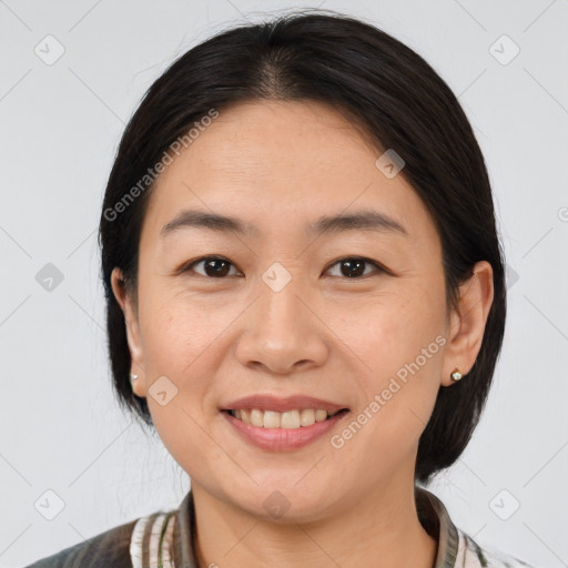 Joyful white young-adult female with medium  brown hair and brown eyes