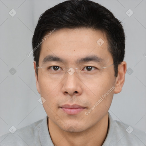 Neutral asian young-adult male with short  brown hair and brown eyes