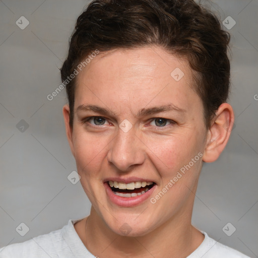 Joyful white young-adult female with short  brown hair and brown eyes