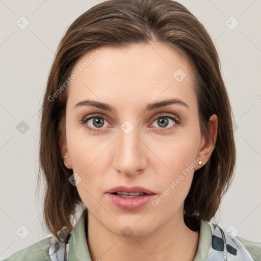 Neutral white young-adult female with medium  brown hair and grey eyes