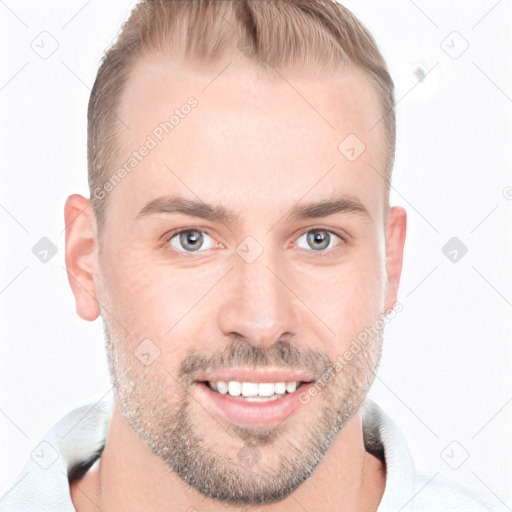 Joyful white young-adult male with short  brown hair and grey eyes