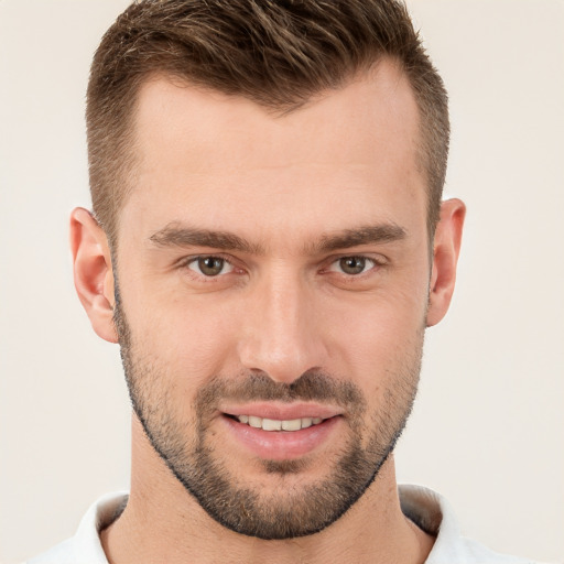 Joyful white young-adult male with short  brown hair and brown eyes