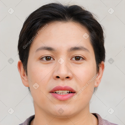 Joyful asian young-adult female with short  brown hair and brown eyes