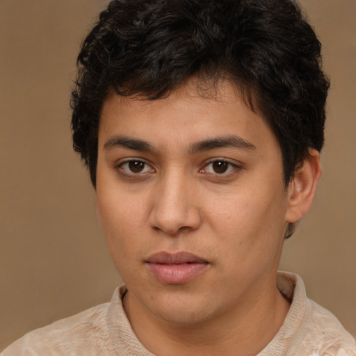 Joyful latino young-adult male with short  brown hair and brown eyes