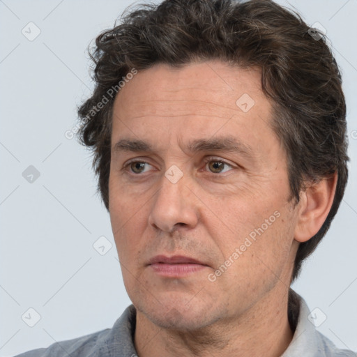 Neutral white adult male with short  brown hair and brown eyes