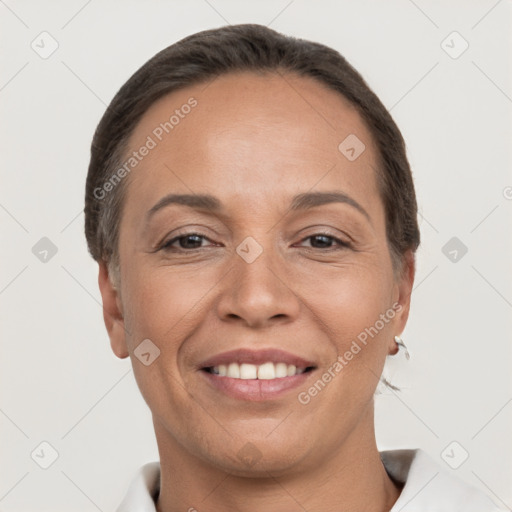 Joyful white adult female with short  brown hair and brown eyes