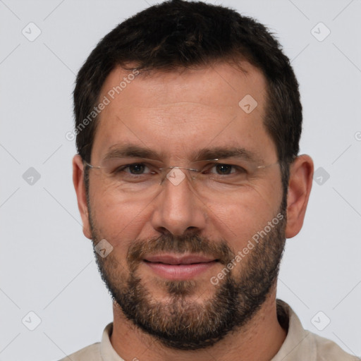 Joyful white adult male with short  brown hair and brown eyes