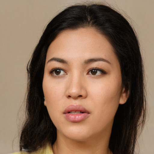 Neutral asian young-adult female with long  brown hair and brown eyes