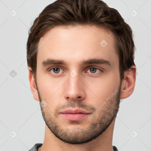 Neutral white young-adult male with short  brown hair and brown eyes