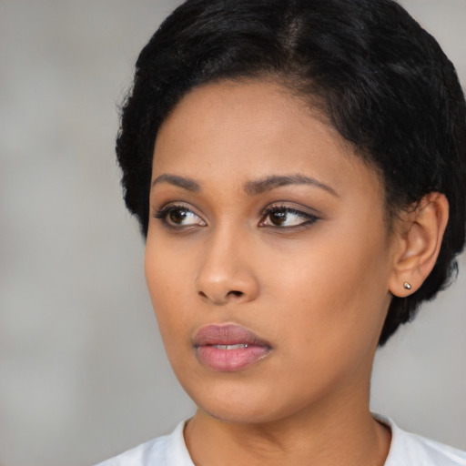Neutral asian young-adult female with short  black hair and brown eyes
