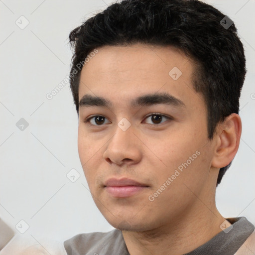 Neutral white young-adult male with short  black hair and brown eyes