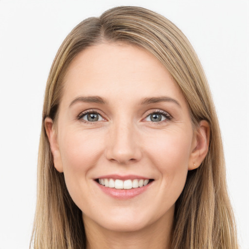 Joyful white young-adult female with long  brown hair and grey eyes