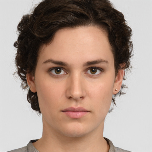 Neutral white young-adult female with short  brown hair and brown eyes