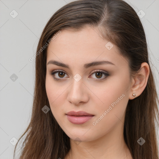 Neutral white young-adult female with long  brown hair and brown eyes