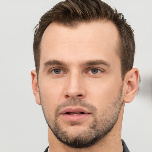 Neutral white young-adult male with short  brown hair and brown eyes