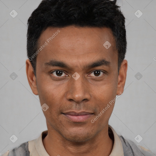 Neutral latino young-adult male with short  black hair and brown eyes