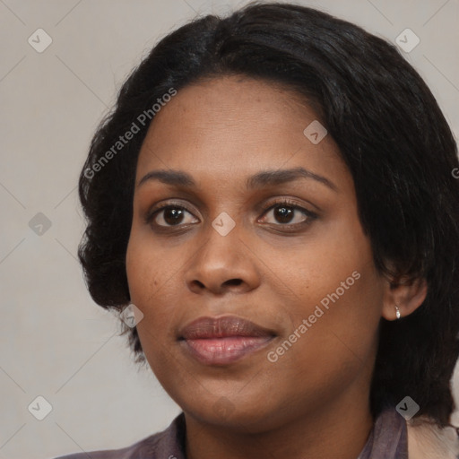 Joyful black young-adult female with medium  black hair and brown eyes