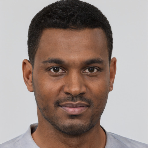 Neutral black young-adult male with short  black hair and brown eyes