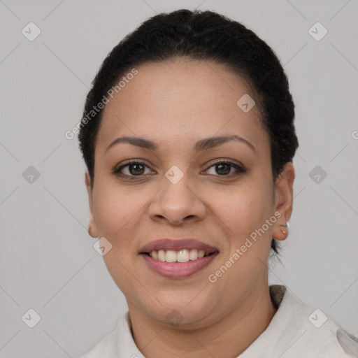 Joyful latino young-adult female with short  brown hair and brown eyes