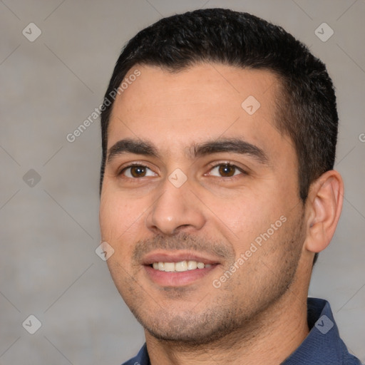 Joyful white young-adult male with short  black hair and brown eyes