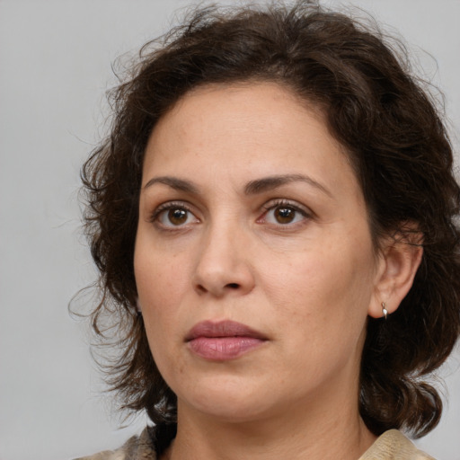 Neutral white adult female with medium  brown hair and brown eyes