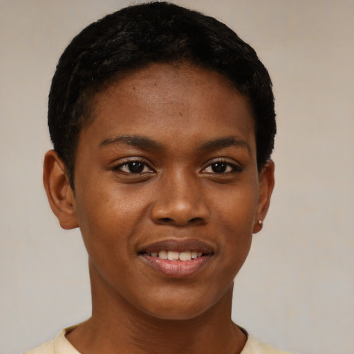 Joyful black young-adult female with short  brown hair and brown eyes