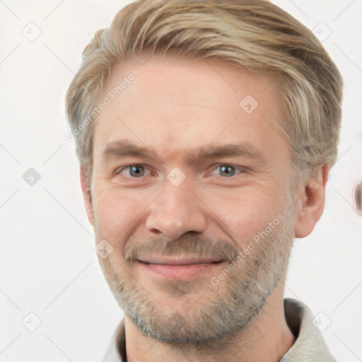 Joyful white adult male with short  brown hair and grey eyes