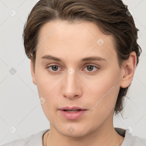 Neutral white young-adult female with short  brown hair and brown eyes