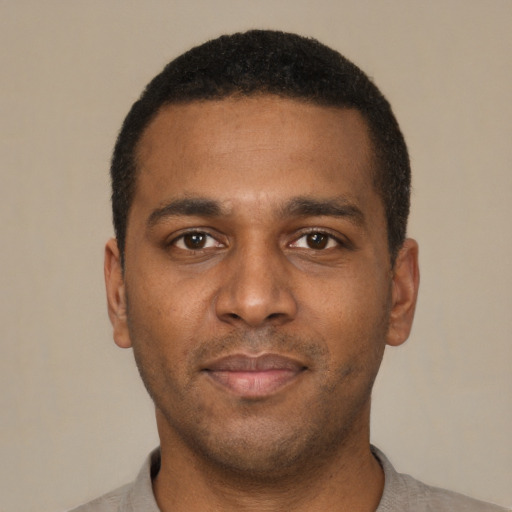 Neutral black young-adult male with short  black hair and brown eyes