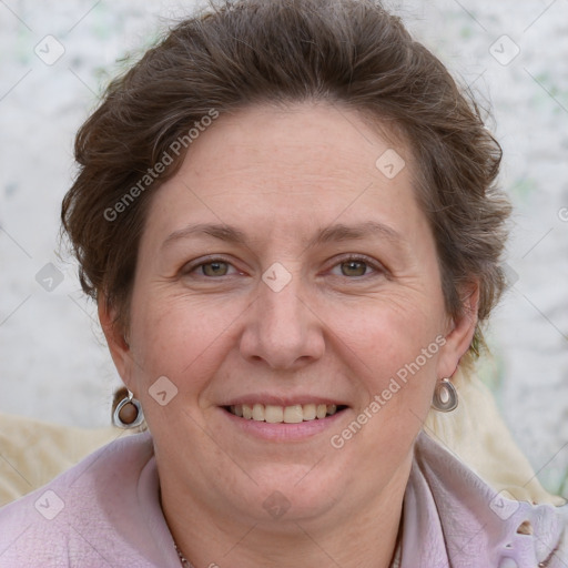 Joyful white adult female with short  brown hair and grey eyes