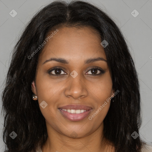 Joyful black young-adult female with long  brown hair and brown eyes