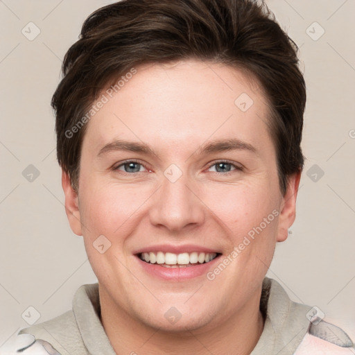 Joyful white young-adult female with short  brown hair and grey eyes