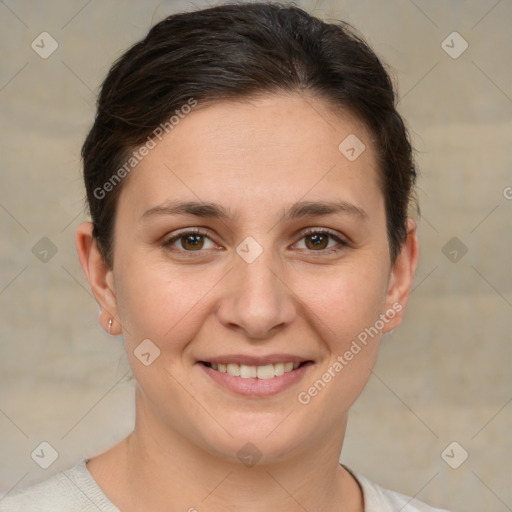 Joyful white young-adult female with short  brown hair and brown eyes