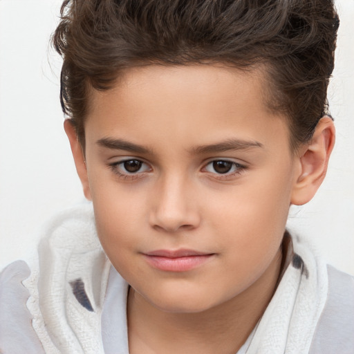 Joyful white child female with short  brown hair and brown eyes